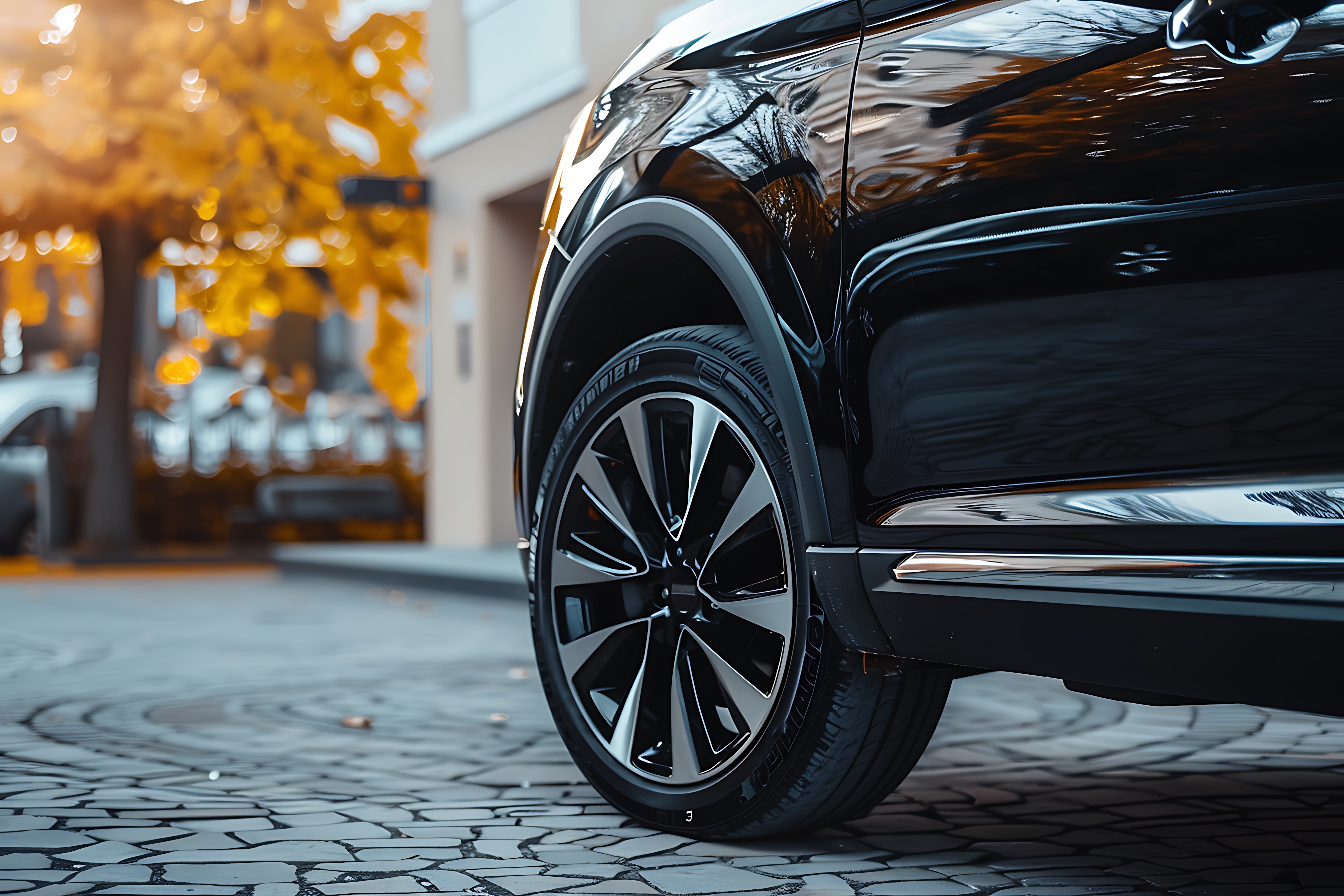Modern black car on the street. Close-up