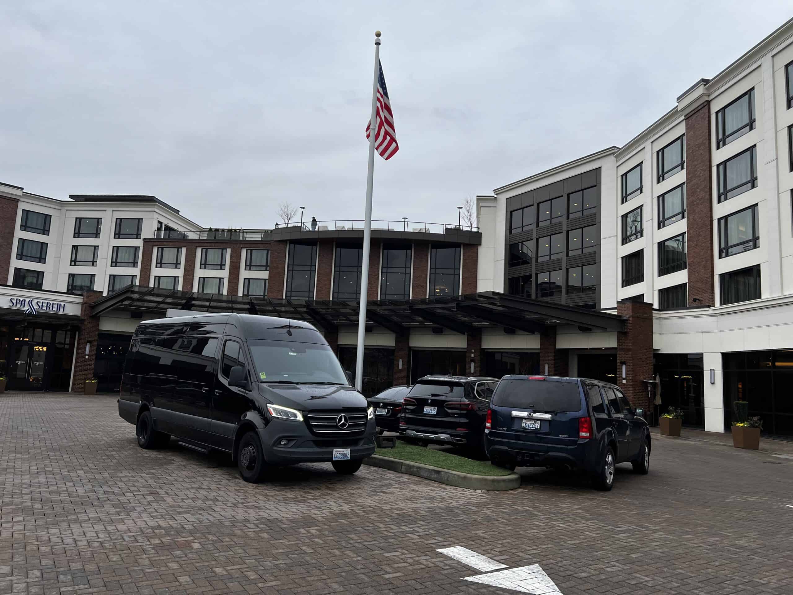 All Black Limo chauffeur and vehicle ready for a Tacoma pickup
