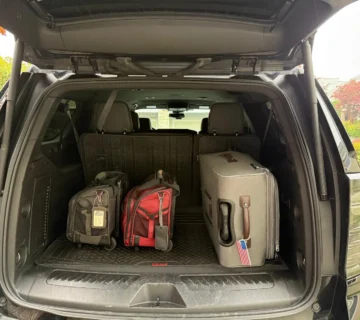 "How many bags fit in an SUV with First Class SUV luggage capacity"